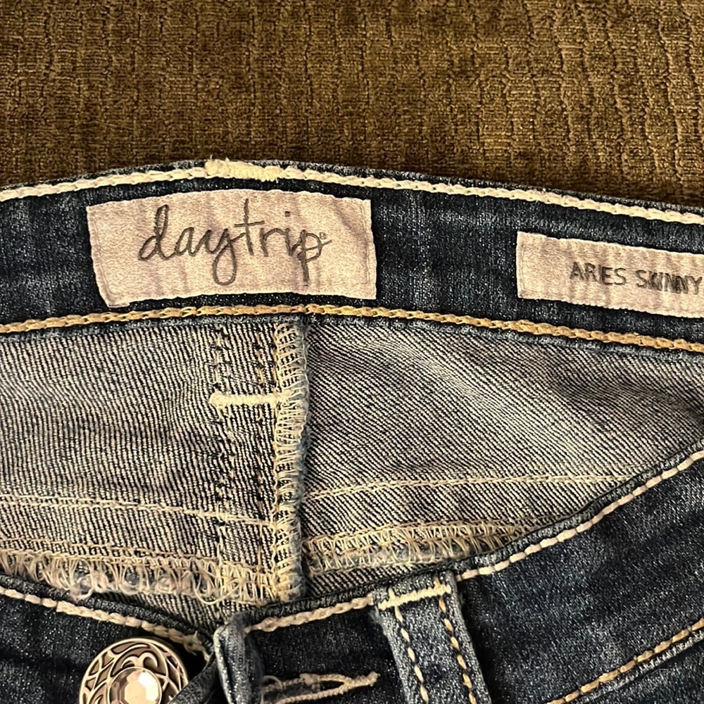 Buckle daytrip Aries skinny. Very cute, short waist.